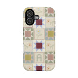 Patchwork personalized iPhone case featuring a colorful quilt design with various geometric patterns and floral accents.