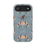 Prairie personalized iPhone case featuring a blue background with horse and floral patterns, and a monogram letter 'A'.