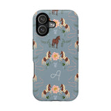 Prairie personalized iPhone case featuring a blue background with floral and horse patterns, including a monogrammed lette...