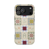 Patchwork personalized iPhone case featuring a colorful quilt design with various geometric patterns and soft colors.