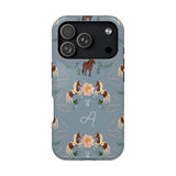 Prairie personalized iPhone case featuring a blue background with horse and floral patterns, and an initial "A" design.