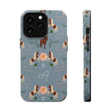 Prairie personalized iPhone case featuring a blue background with floral and horse patterns, including a monogrammed lette...