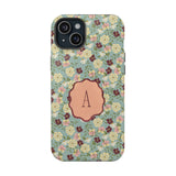 Personalized Posy iPhone case featuring a floral pattern in green, with a monogrammed letter "A" on a wooden label.
