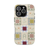 Patchwork personalized iPhone case featuring a colorful quilt design with various geometric patterns.