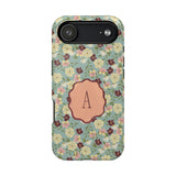 Posy personalized iPhone case featuring a floral design with a central monogrammed letter "A" on a light blue background.