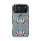 Prairie personalized iPhone case featuring a blue background with horse and floral patterns, and an initial "A" design.
