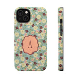 Personalized iPhone case featuring a floral design with an initial "A" on a light blue background.