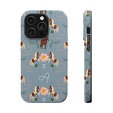 Prairie personalized iPhone case featuring a blue background with horses, flowers, and a monogrammed letter 'A'.