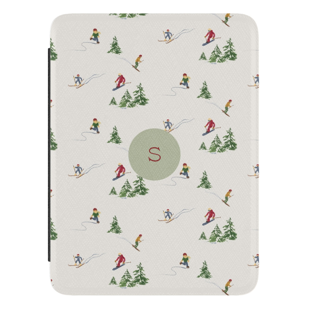 Slopes Personalized Kindle case, close-up of the front: little skiers and snowy pine trees on cream with the initial S