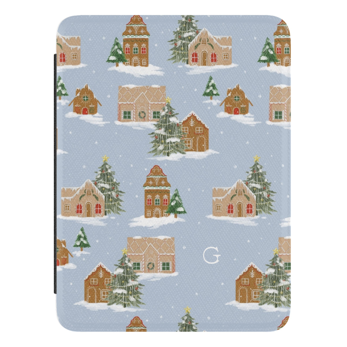 Gingerbread Village Personalized Kindle case, close-up of the front: gingerbread houses and snowy evergreens on pale blue with the initial G