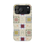 Patchwork personalized iPhone case featuring a colorful quilt design with various geometric patterns and soft colors.