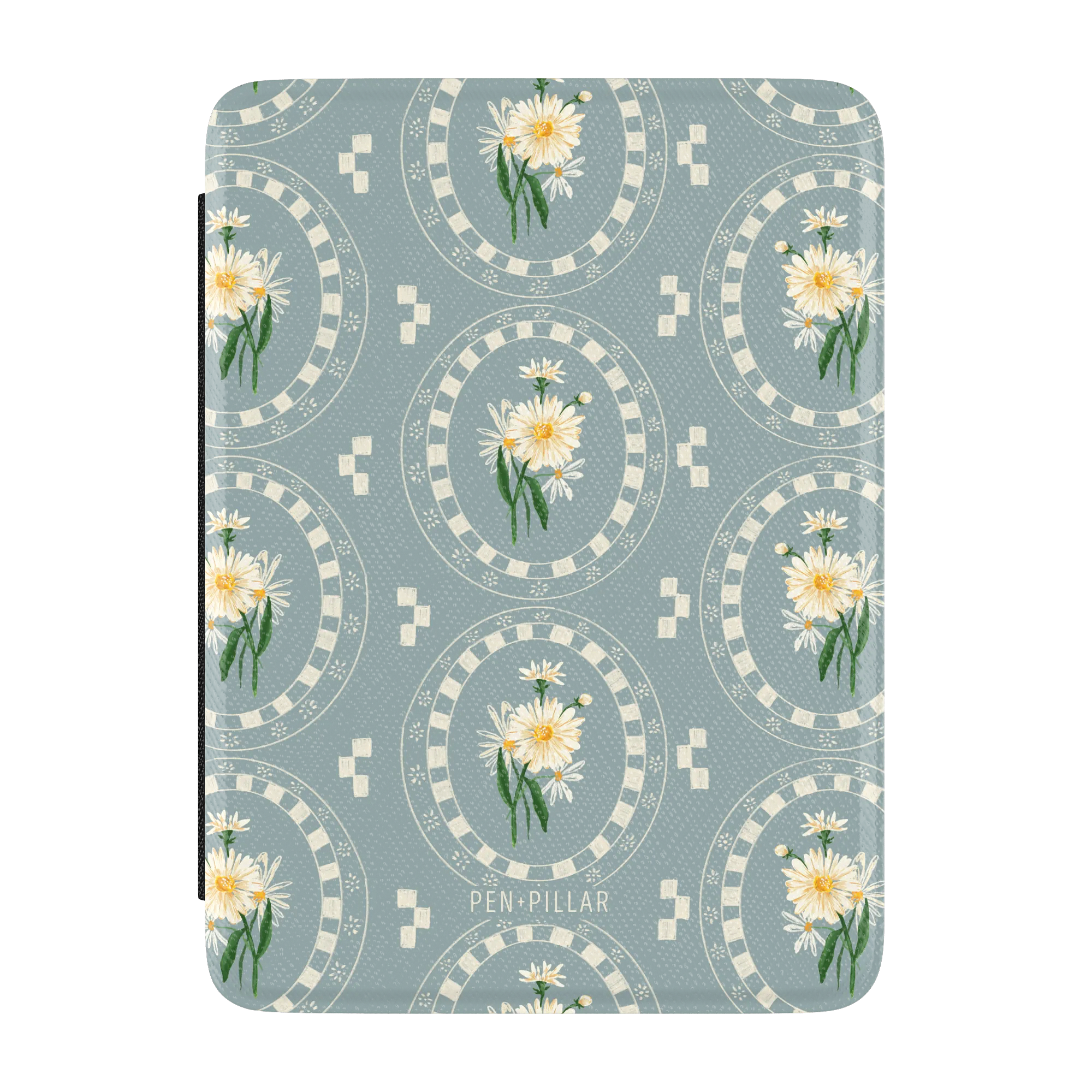 Blue Kindle case with white daisy bouquets in oval frames and PEN+PILLAR printed at the bottom.