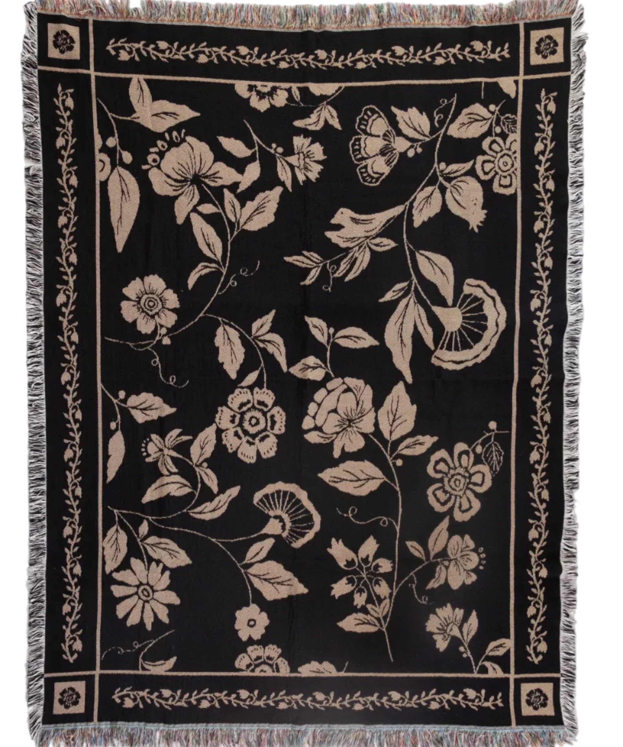 Floral patterned throw blanket on a white background