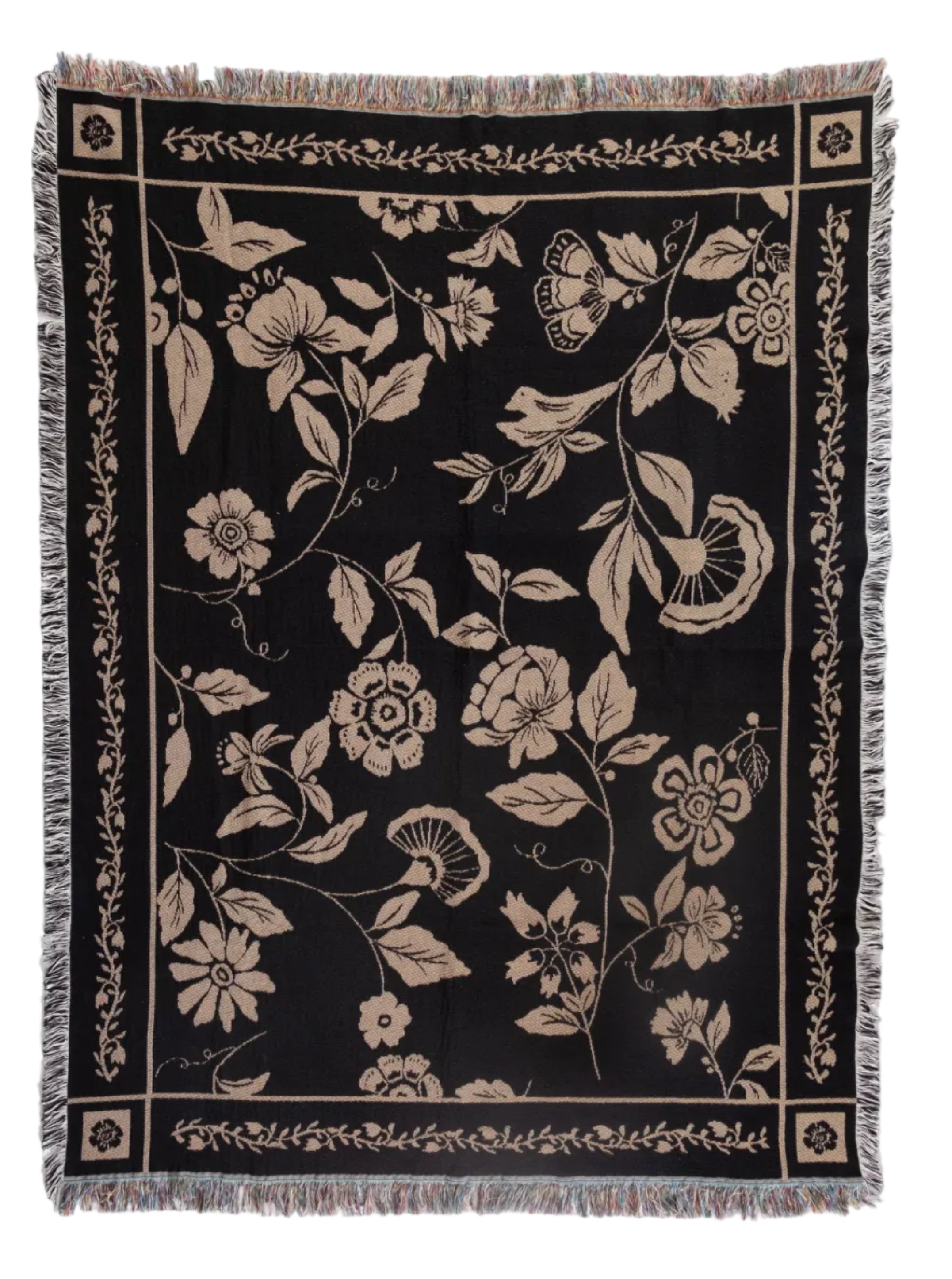 Floral patterned throw blanket on a white background