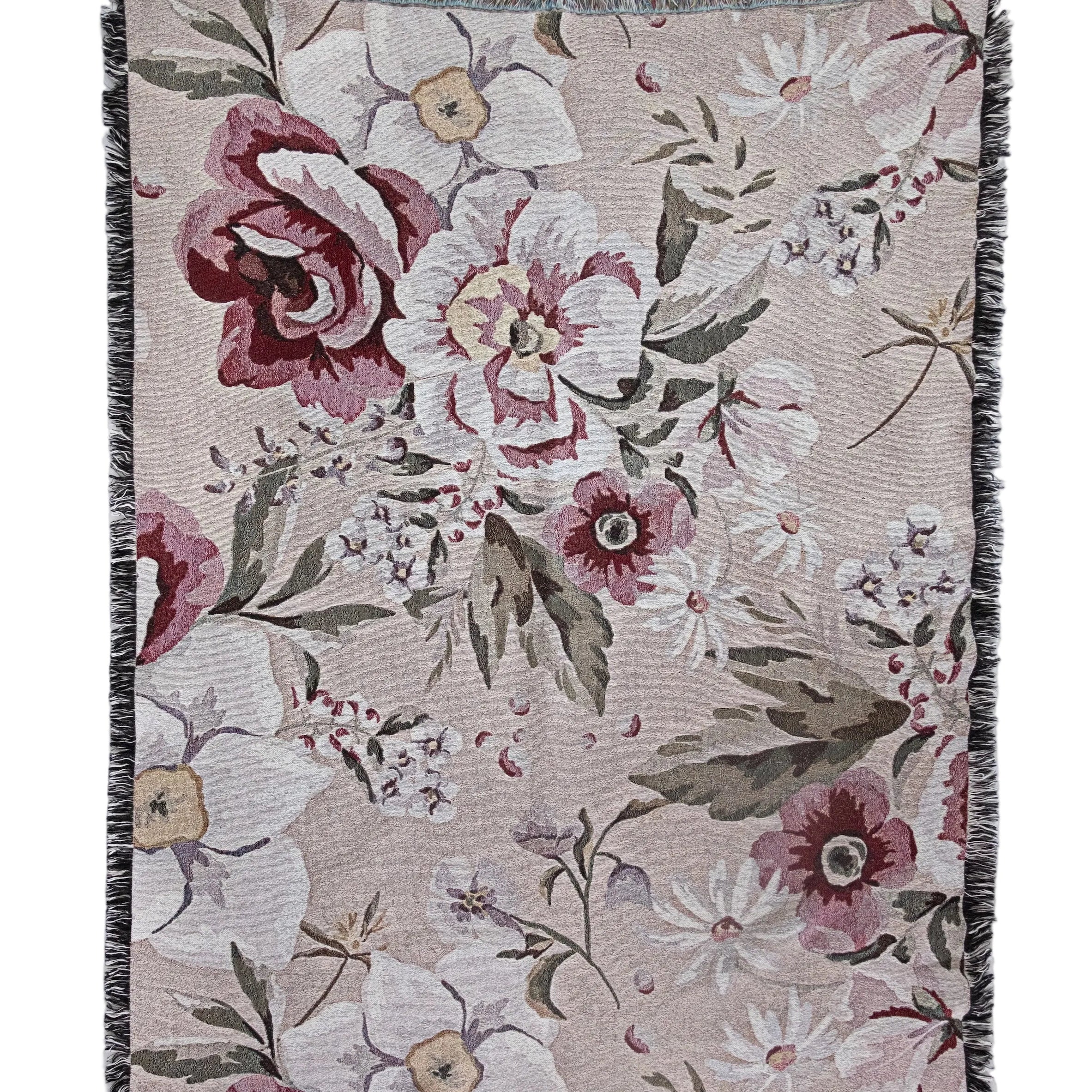 Floral patterned throw blanket on a white background