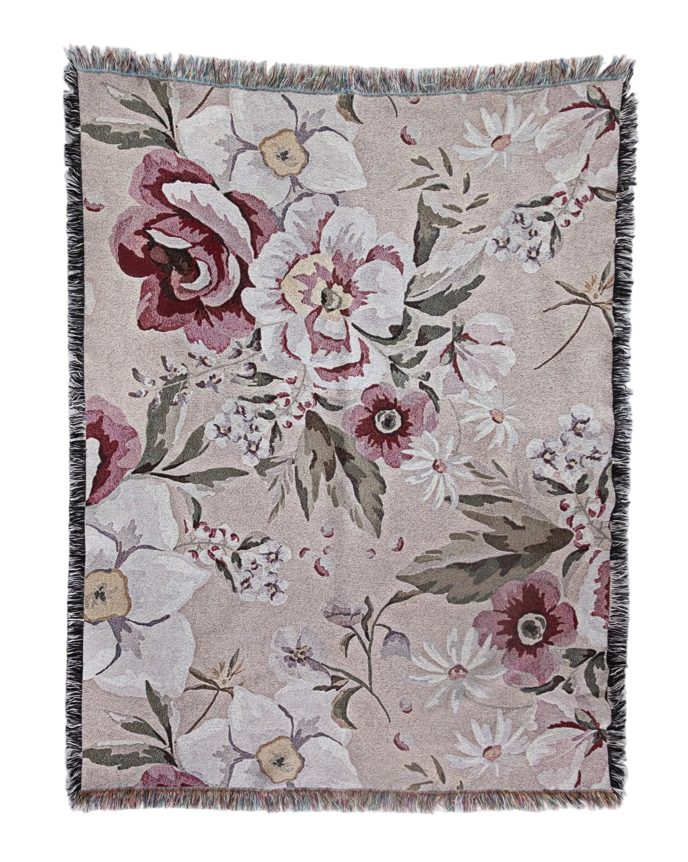 Floral patterned throw blanket on a white background