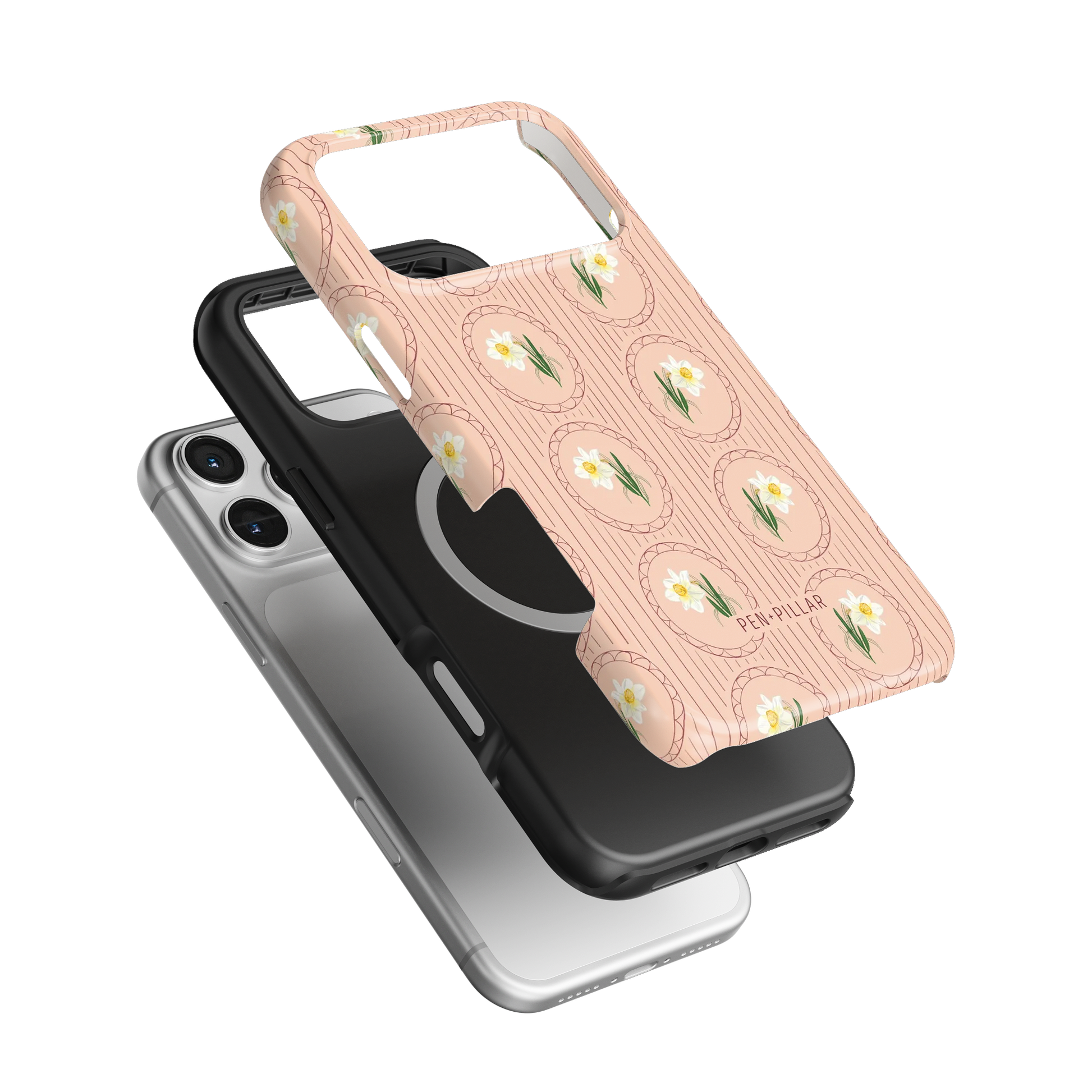 Pink plastic iPhone case with white narcissus flowers and Pen + Pillar text, shown with a black liner and silver phone.