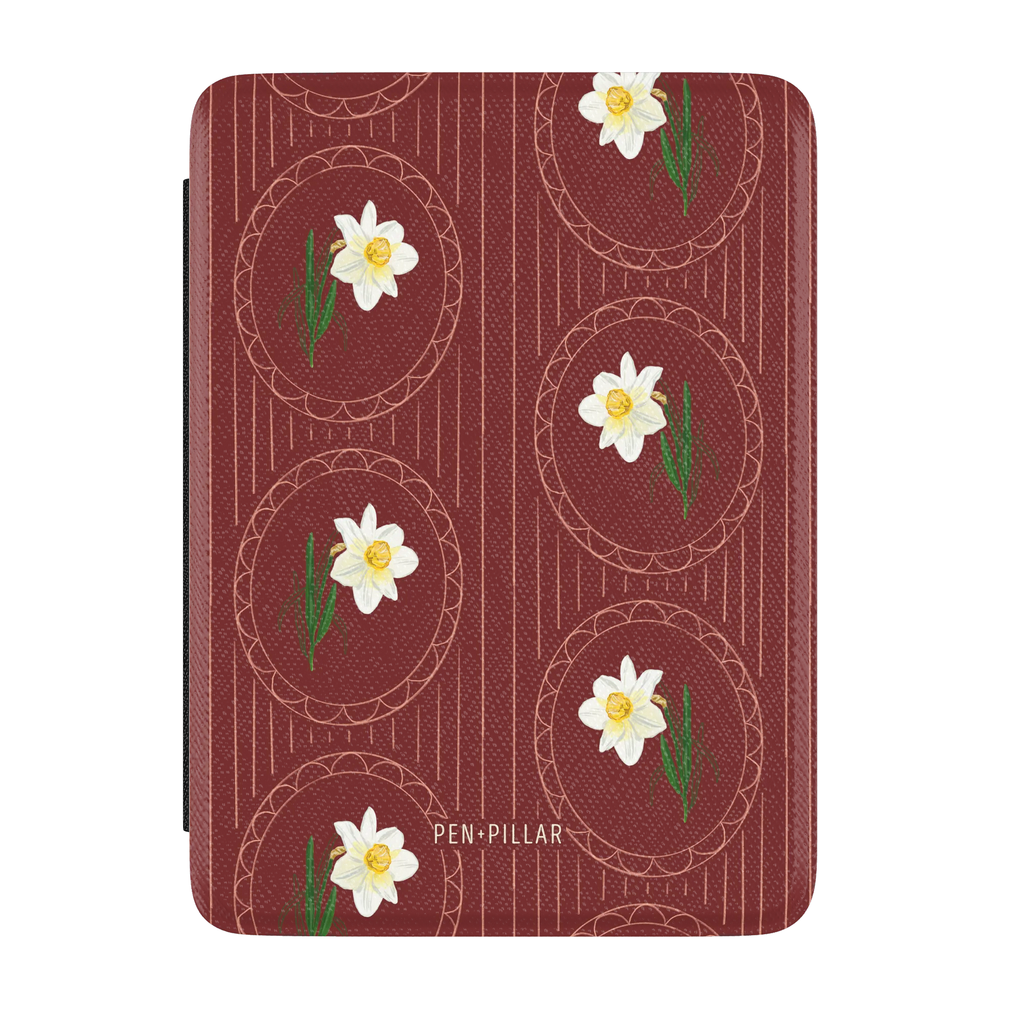 Red Kindle case with a white narcissus flower pattern in oval frames and PEN+PILLAR printed in white text.