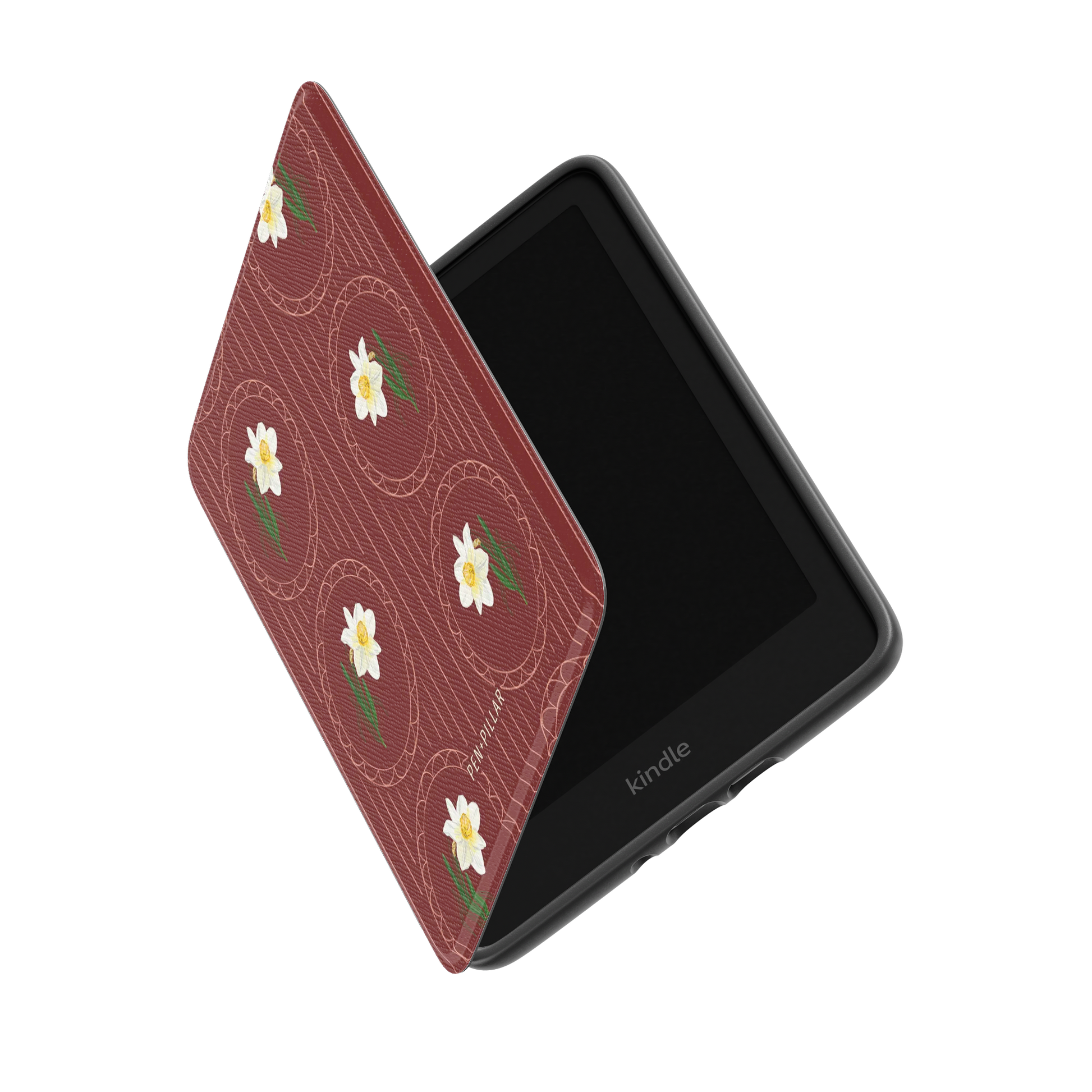 Red Kindle case with white and yellow flowers in circles, labeled PEN+PILLAR, shown on a black e-reader.