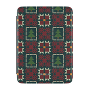 Evergreen Kindle case, front cover: deep green quilt blocks with red stars and small pine trees