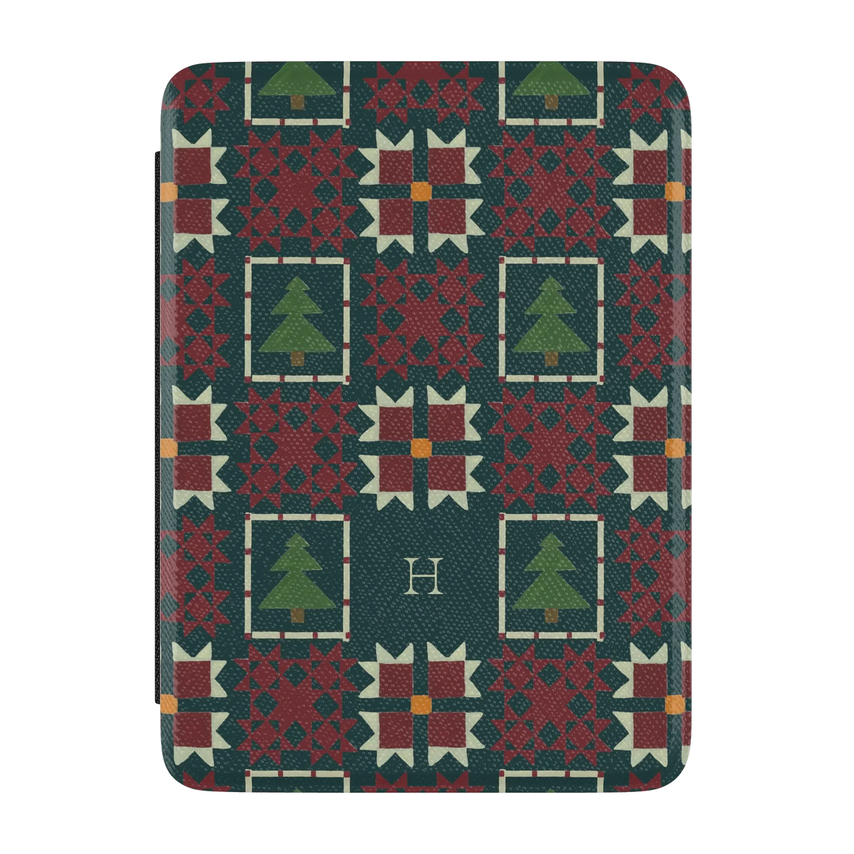 Evergreen Personalized Kindle case, front cover: deep green quilt blocks with red stars and small pine trees with the initial H