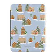 Gingerbread Village Kindle case, front cover: gingerbread houses and snowy evergreens on pale blue