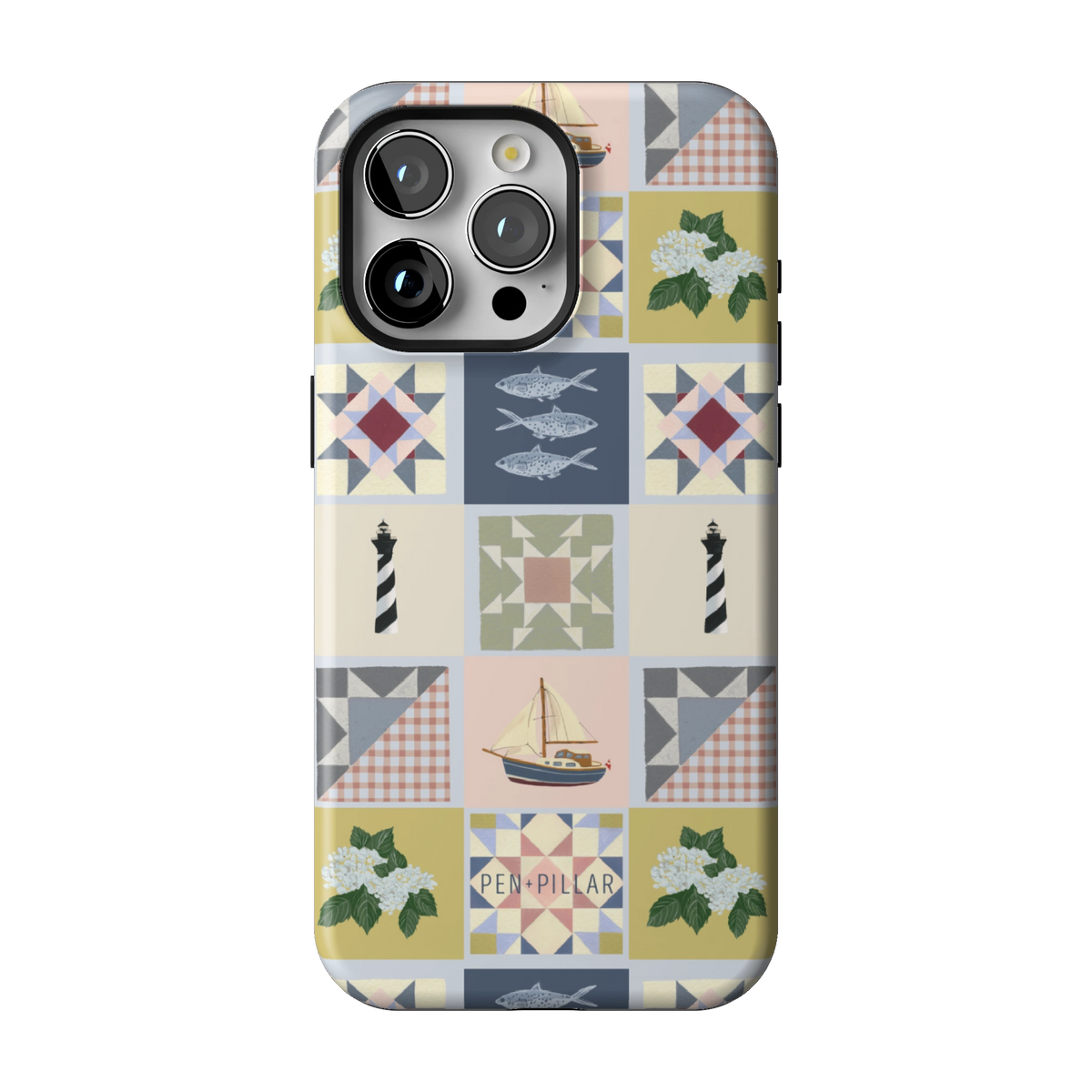 Coastal Quilt case on iPhone 15 Pro Max, back view: quilt blocks with sailboats, fish, a lighthouse and hydrangeas in navy, sage and blush