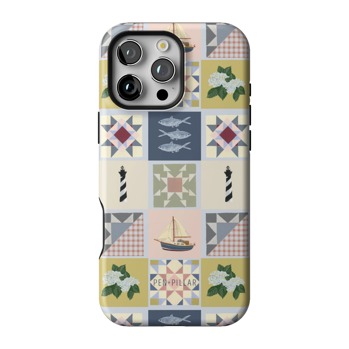 Coastal Quilt case on iPhone 16 Pro Max, back view: quilt blocks with sailboats, fish, a lighthouse and hydrangeas in navy, sage and blush
