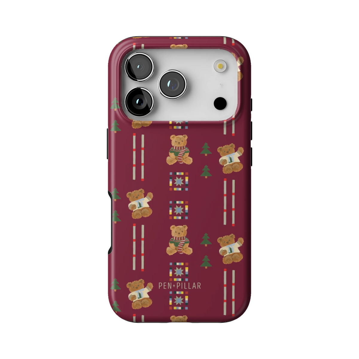 Teddy case on iPhone 17 Pro, back view: teddy bears in scarves and small pine trees on cranberry red