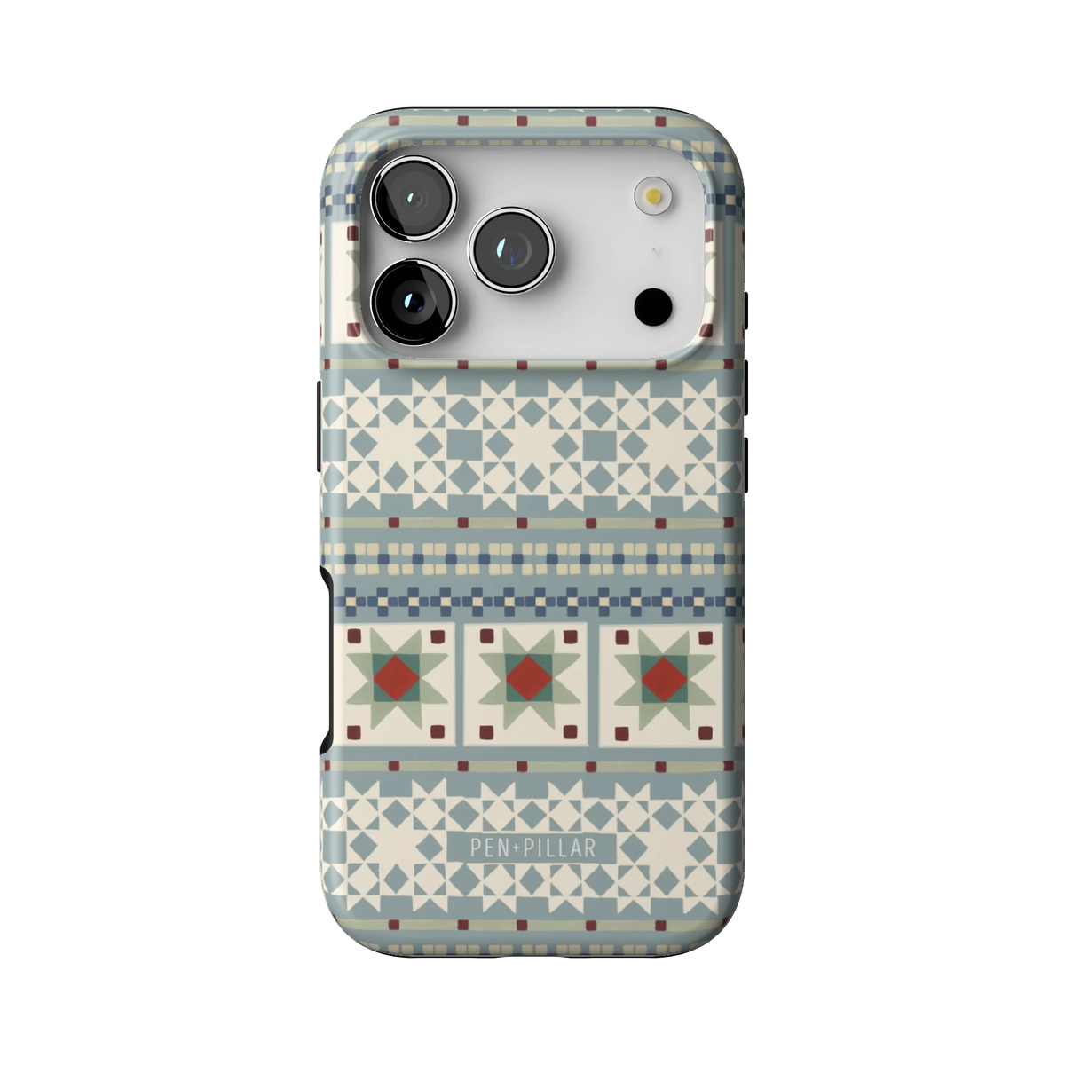Winterberry case on iPhone 17 Pro, back view: pale blue Fair Isle bands with red and green quilt stars