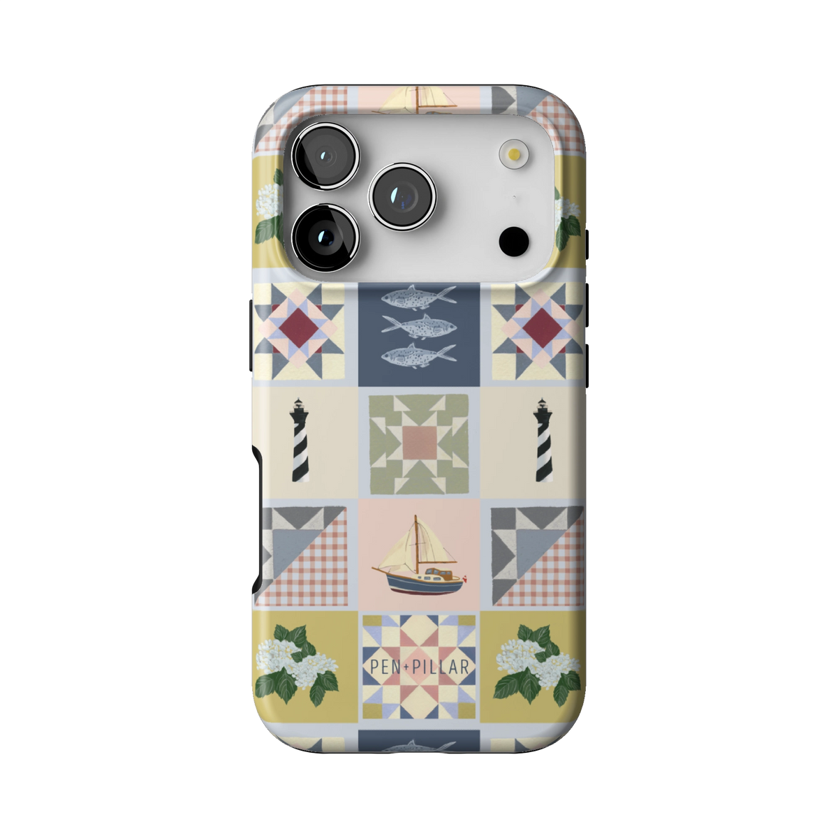 Coastal Quilt case on iPhone 17 Pro, back view: quilt blocks with sailboats, fish, a lighthouse and hydrangeas in navy, sage and blush