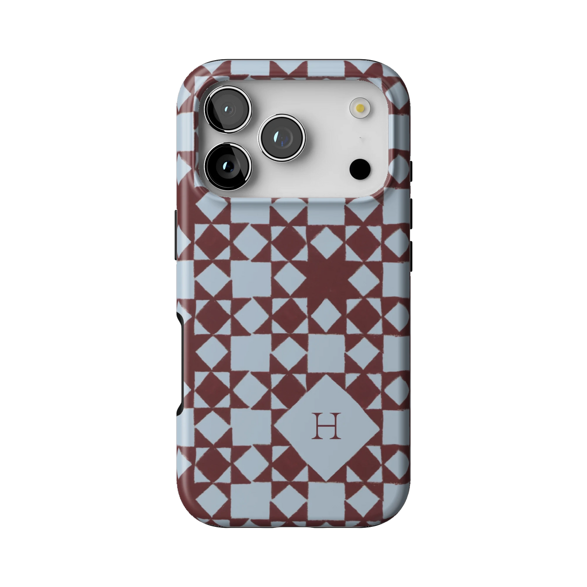 Homespun Personalized case on iPhone 17 Pro, back view: burgundy and pale blue quilt blocks with the initial H