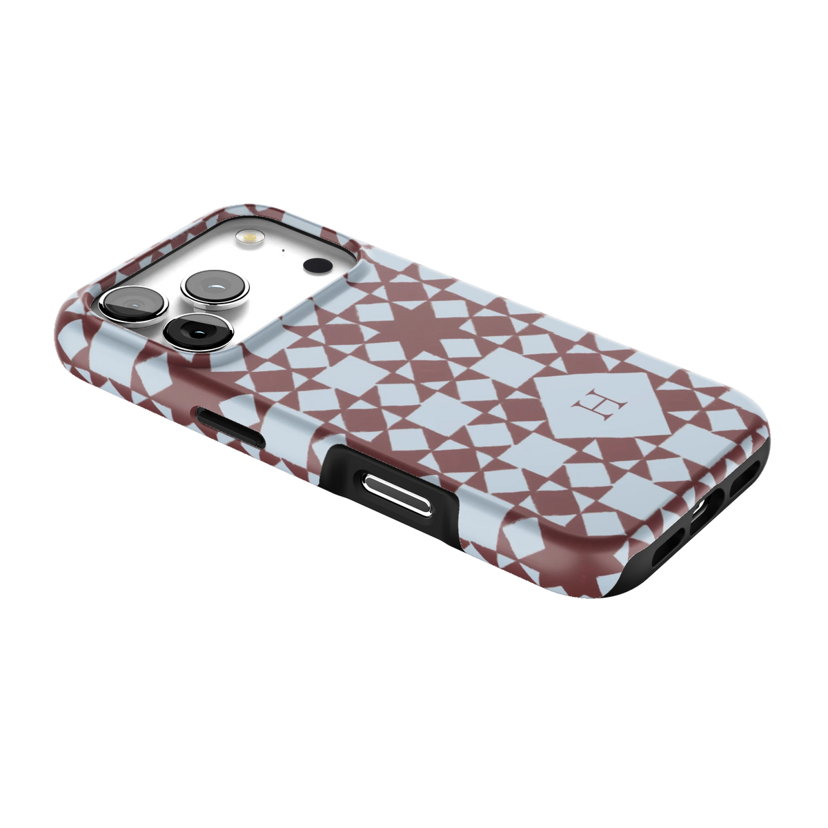 Homespun Personalized iPhone 17 Pro case lying at an angle, showing the side buttons and print wrapping the edges