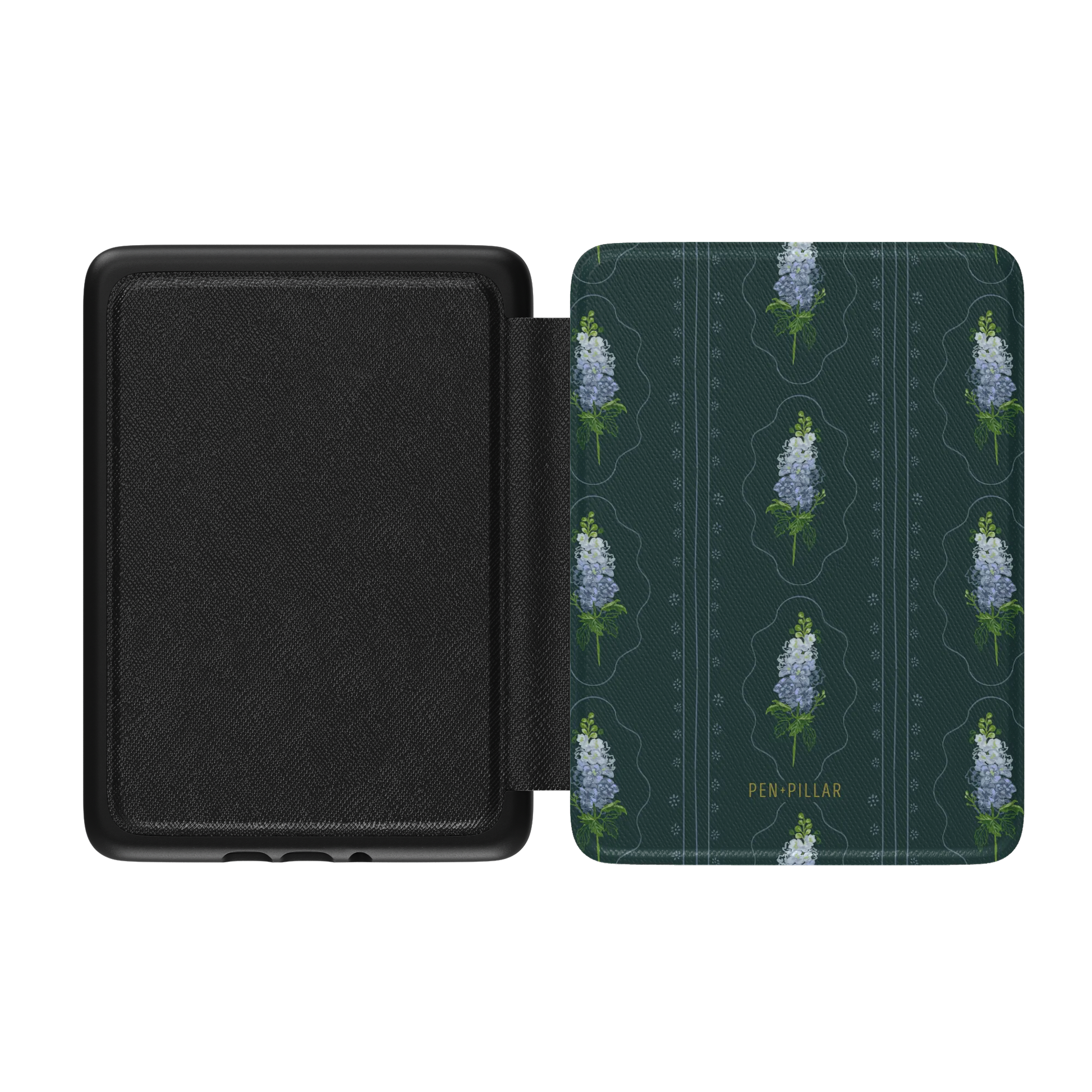 Open black Kindle case with a dark teal fabric cover featuring blue larkspur flowers and the PEN + PILLAR brand name.