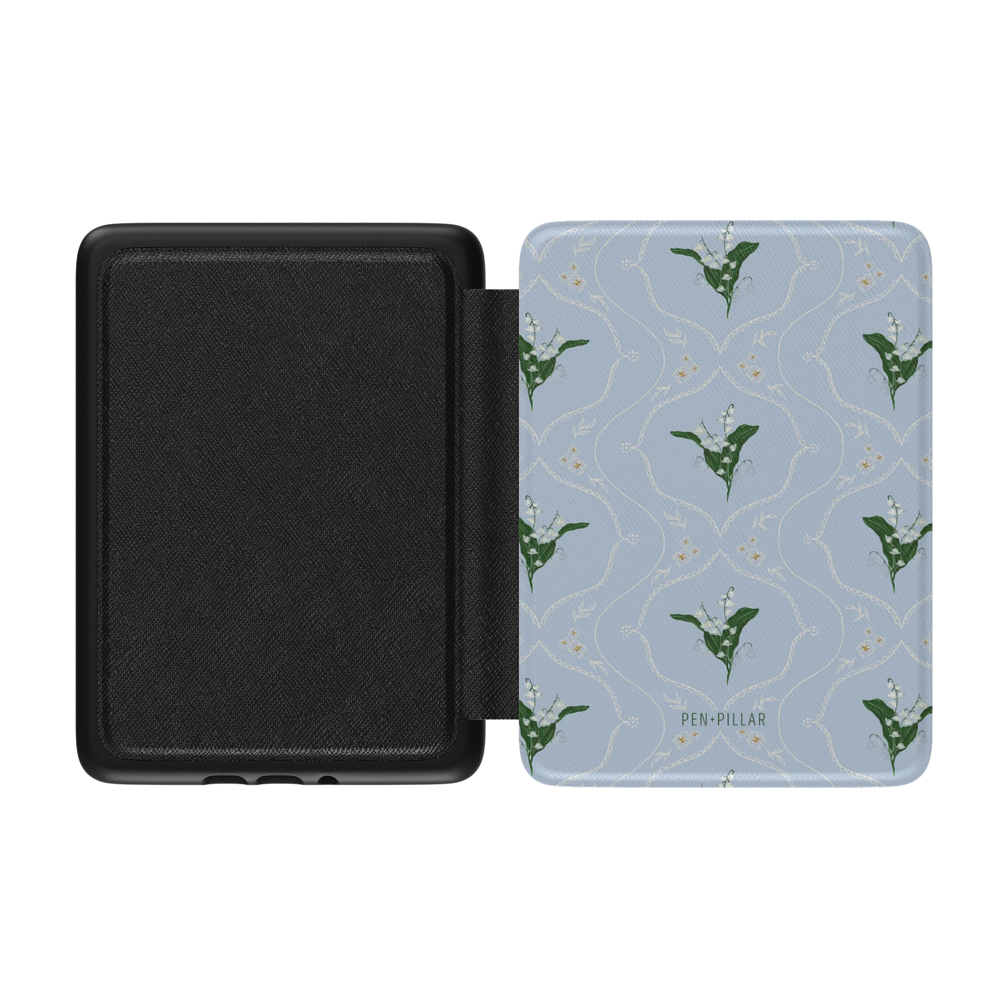 Open blue Kindle case with lily of the valley floral pattern and PEN+PILLAR logo, featuring a black textured interior.