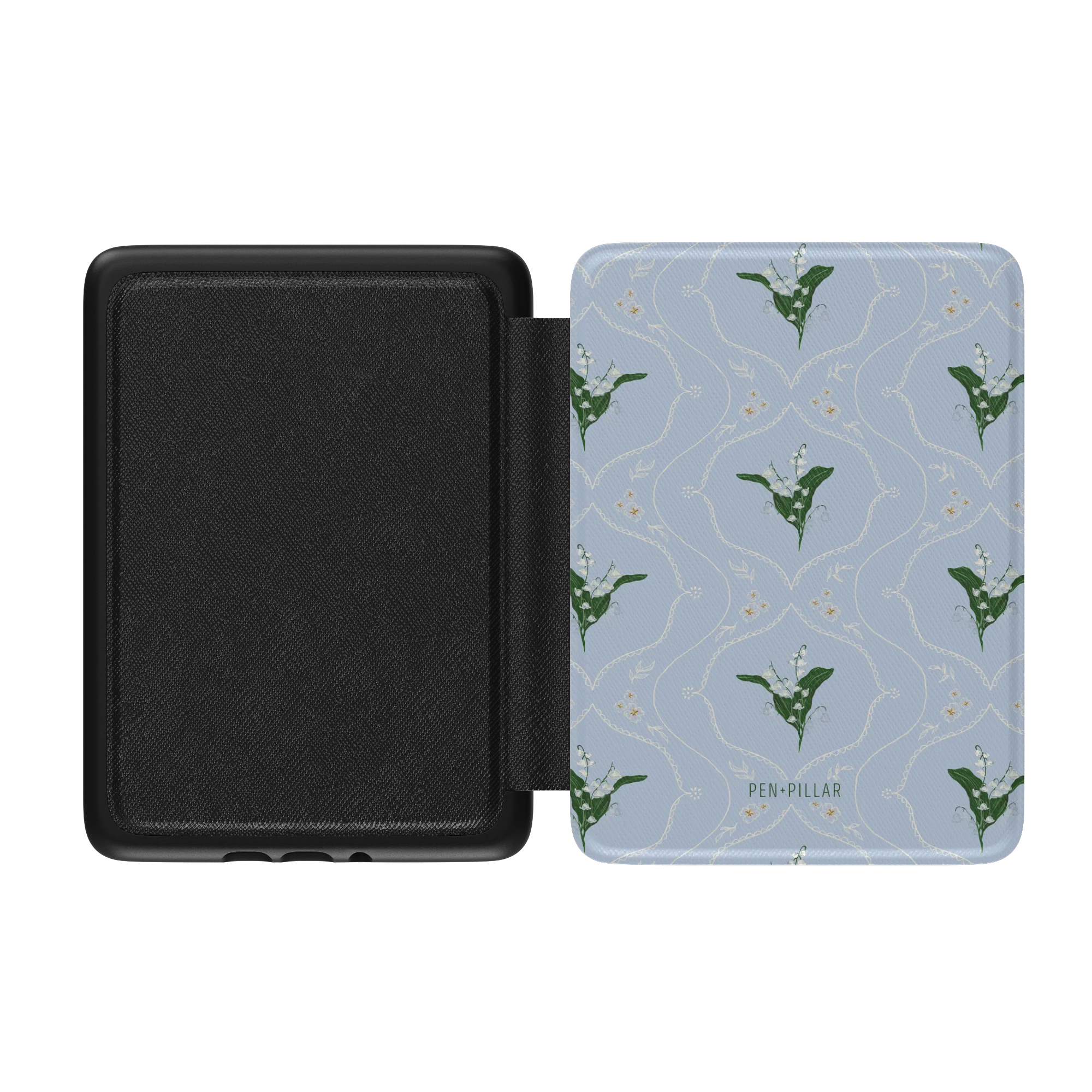 Open blue Kindle case with lily of the valley floral pattern and PEN+PILLAR logo, featuring a black textured interior.