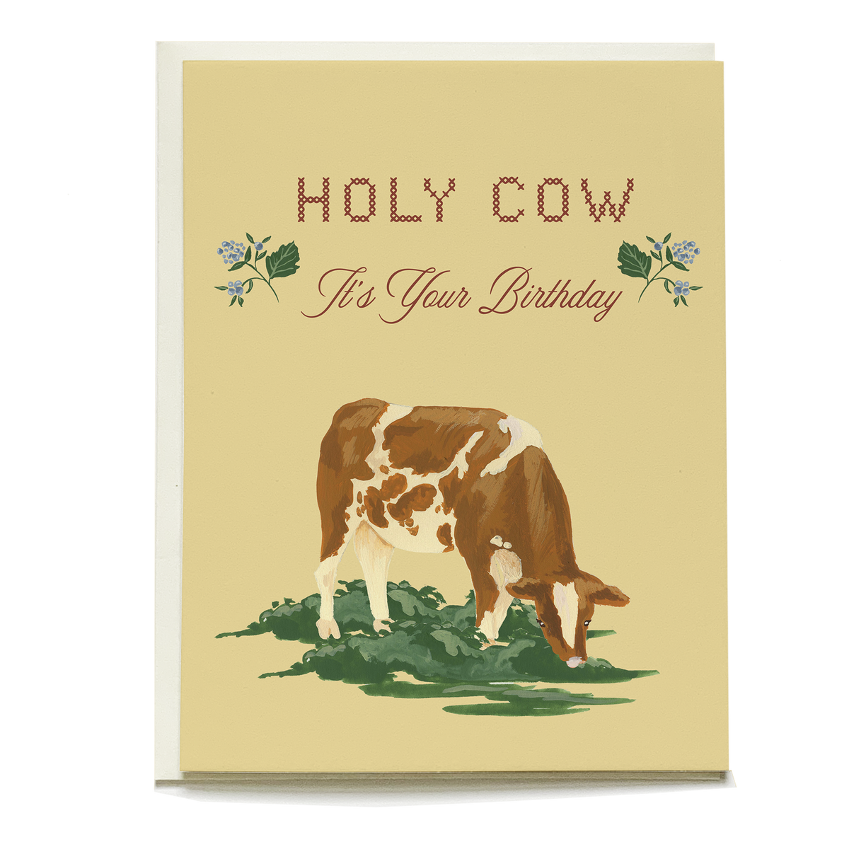 Yellow card featuring a brown and white cow grazing. Text reads: HOLY COW It's Your Birthday.