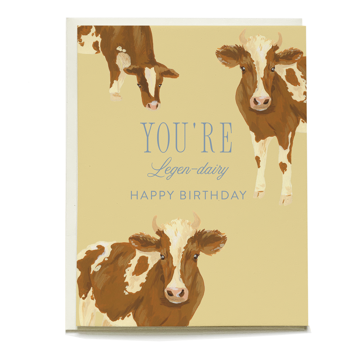 Three brown and white cows on a yellow card with text: YOU'RE Legen-dairy HAPPY BIRTHDAY.