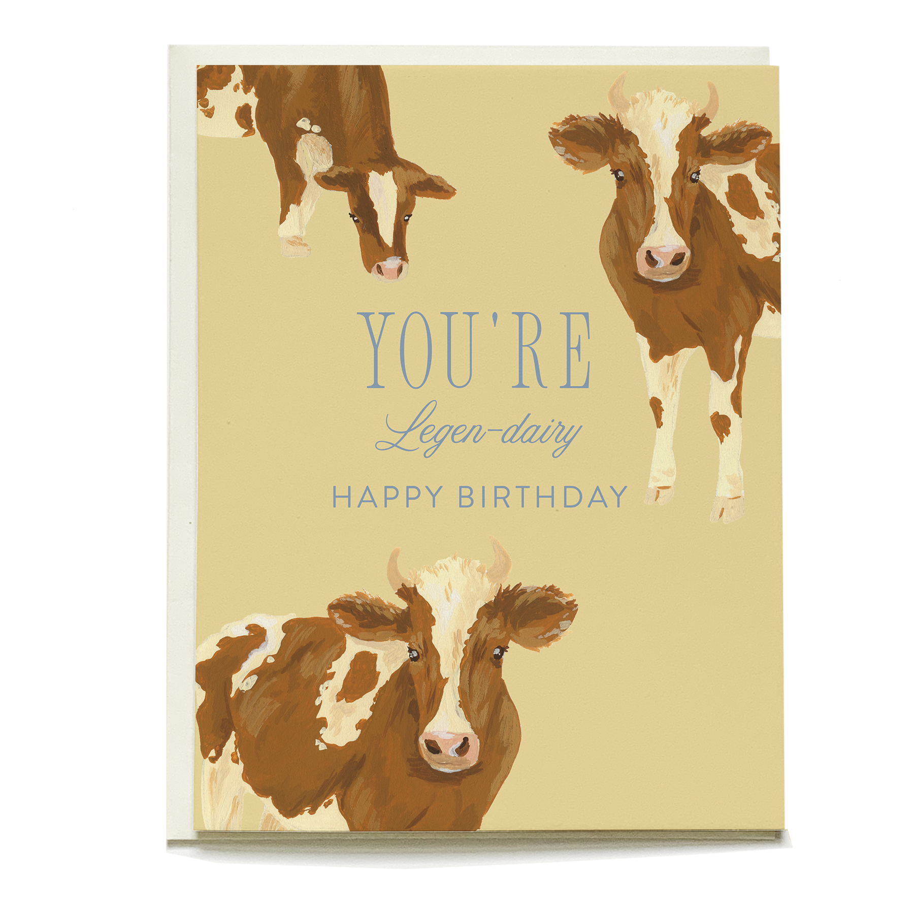Three brown and white cows on a yellow card with text: YOU'RE Legen-dairy HAPPY BIRTHDAY.