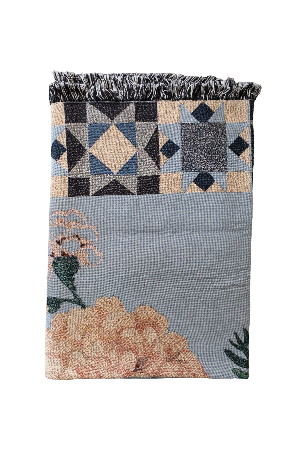 Folded blue woven blanket with a fringed edge, geometric star patterns, and a large peach floral design.