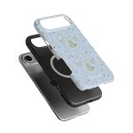 Artichoke iPhone case featuring a light blue floral design, layered over a black phone case.