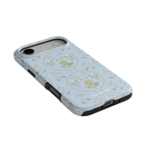 Artichoke iPhone case with a light blue floral pattern and black edges, angled to show the camera cutout.