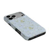 Artichoke iPhone case featuring a light blue floral design with artichokes and small flowers, angled view showing buttons ...