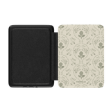 Artichoke Kindle case with a floral design in green and beige, featuring a textured black interior.