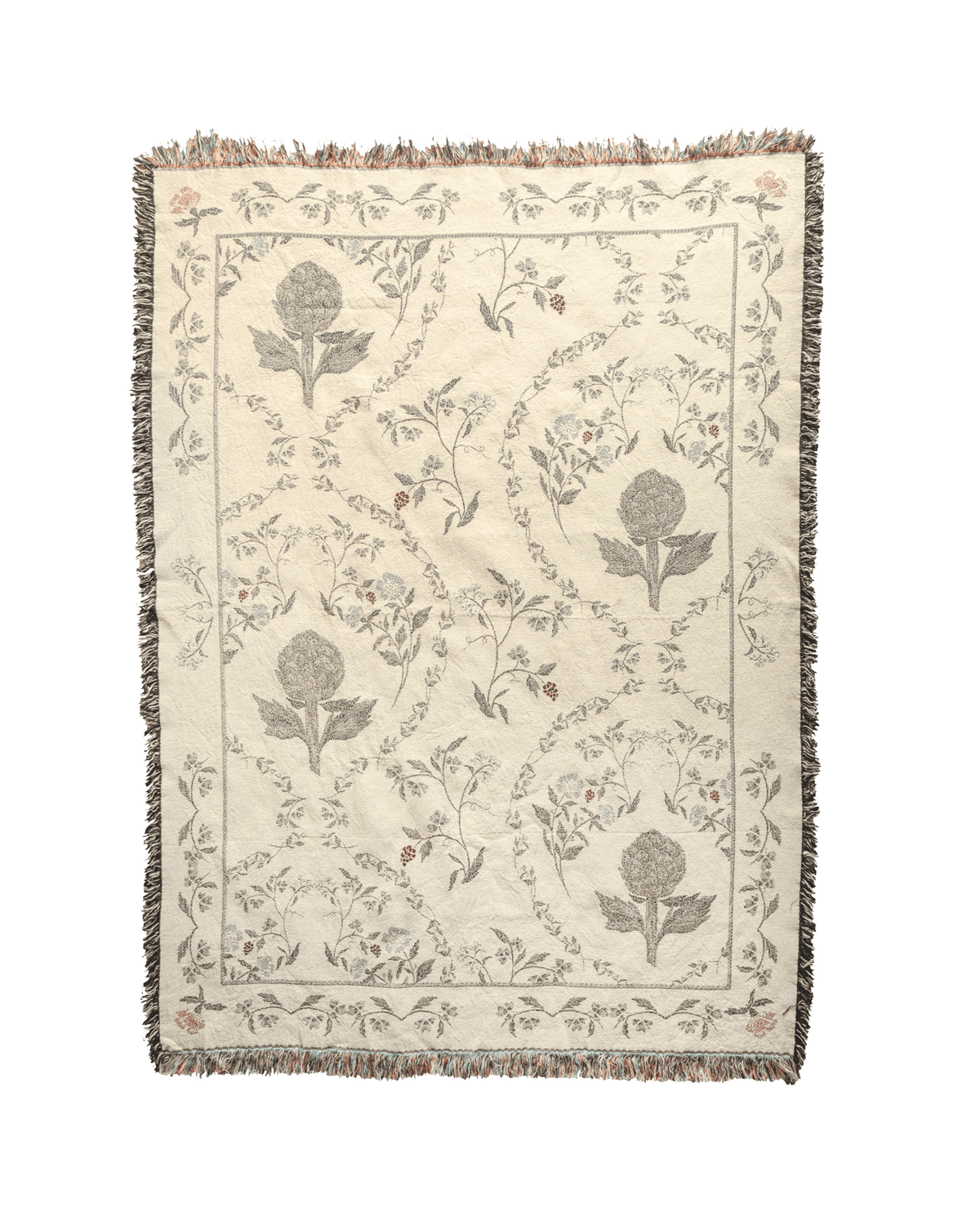Artichoke woven blanket featuring floral patterns in muted colors with a fringed edge.