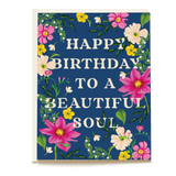 Happy birthday to a beautiful soul card with floral designs in pink, yellow, and green on a navy background.