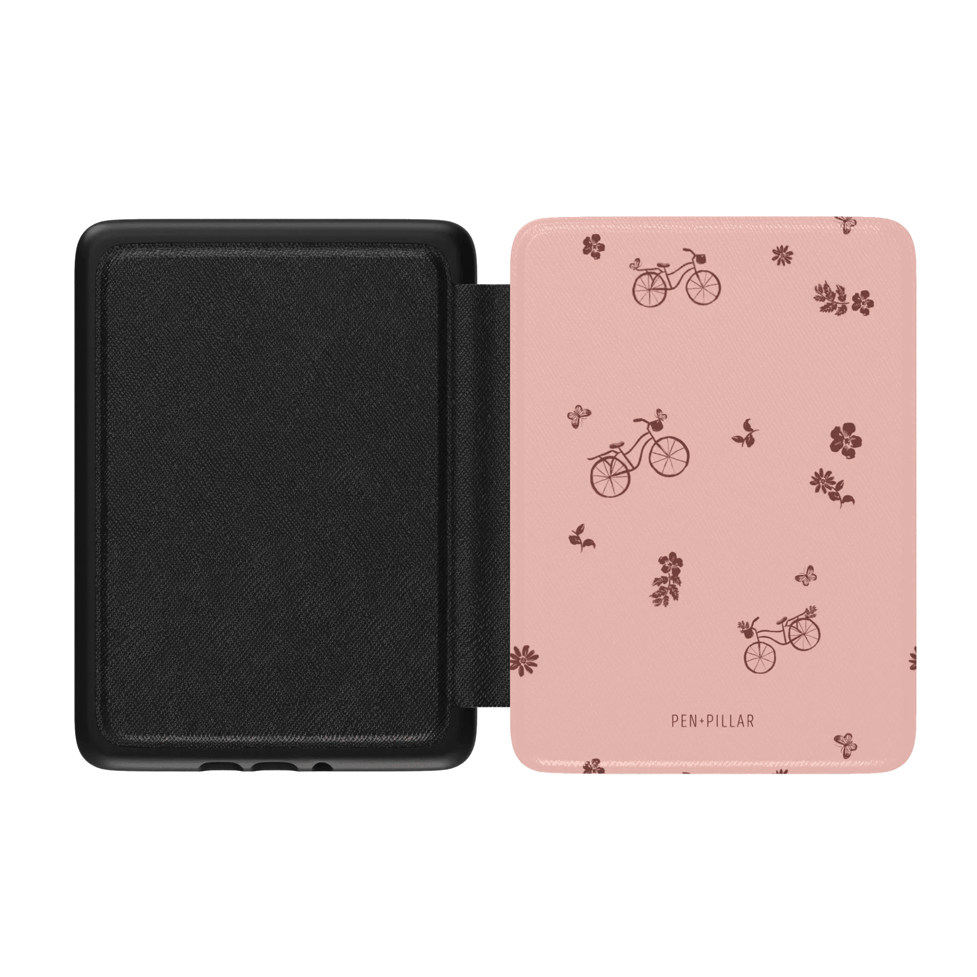 Bike Ride Kindle case featuring a pink exterior with bicycle and flower patterns, black interior, and a magnetic closure.