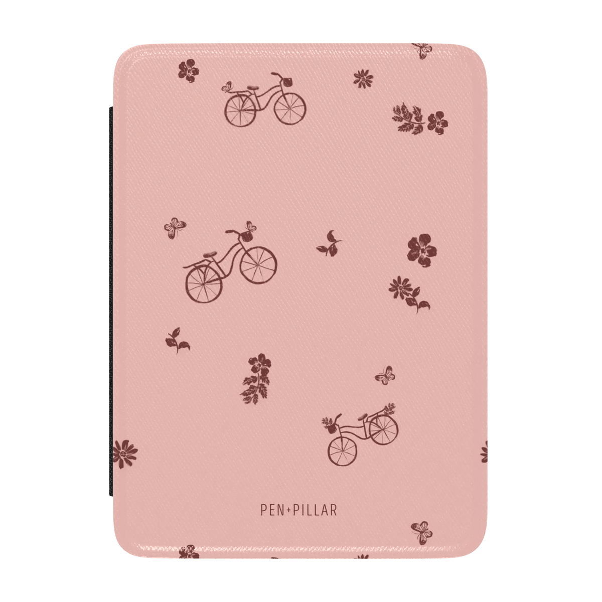Bike ride Kindle case featuring a pink background with brown bicycle and floral patterns.