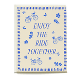 Bike ride wedding card featuring blue bicycles and floral designs with the text "Enjoy the ride together.