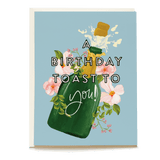 Birthday toast card featuring a green champagne bottle, flowers, and the text "A birthday toast to you!" on a blue backgro...